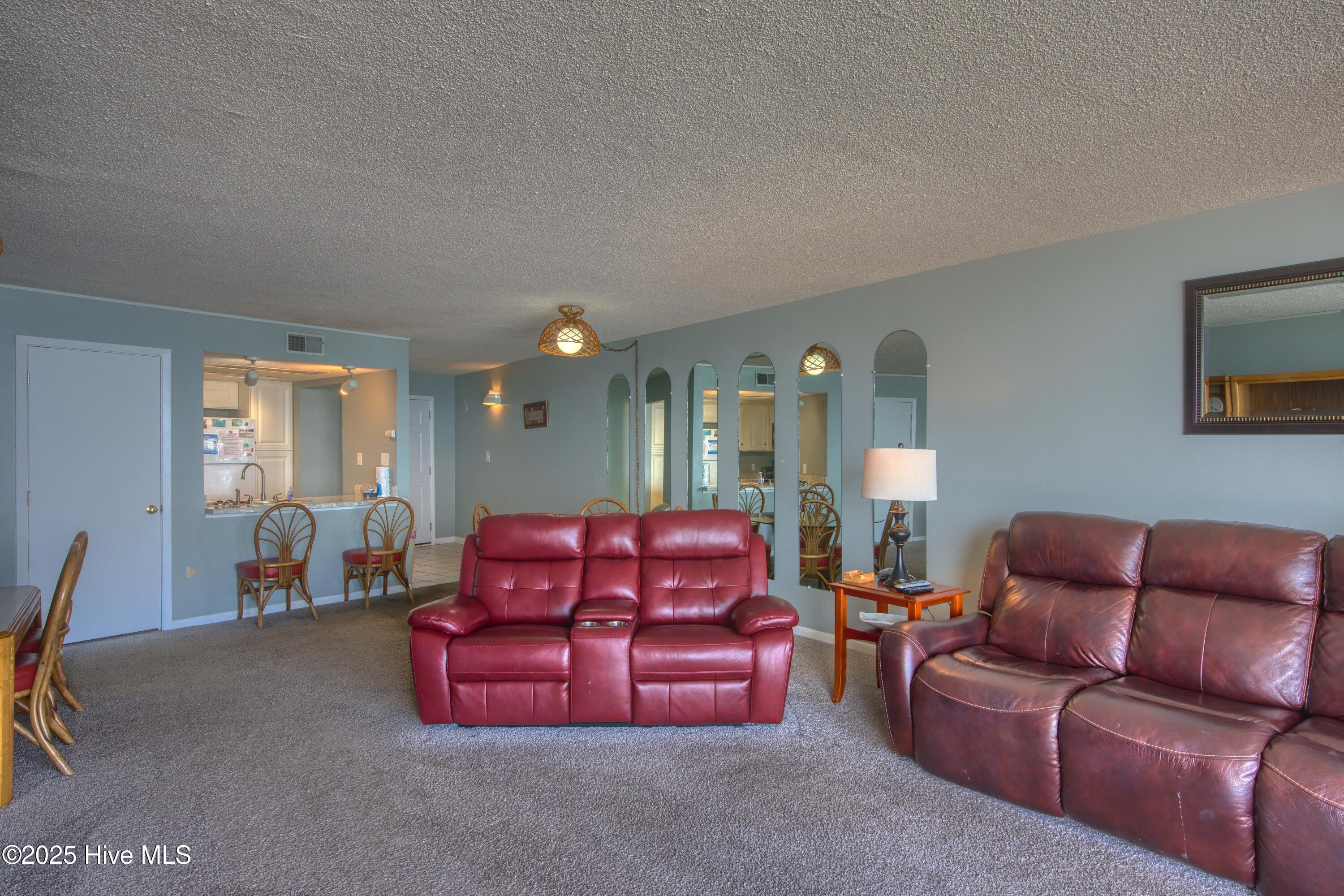 2000 New River Inlet Road, Unit 1207 North Topsail Beach, NC 28460 - Photo 21 of 30 1207 St. Regis - Living room and Bedroom