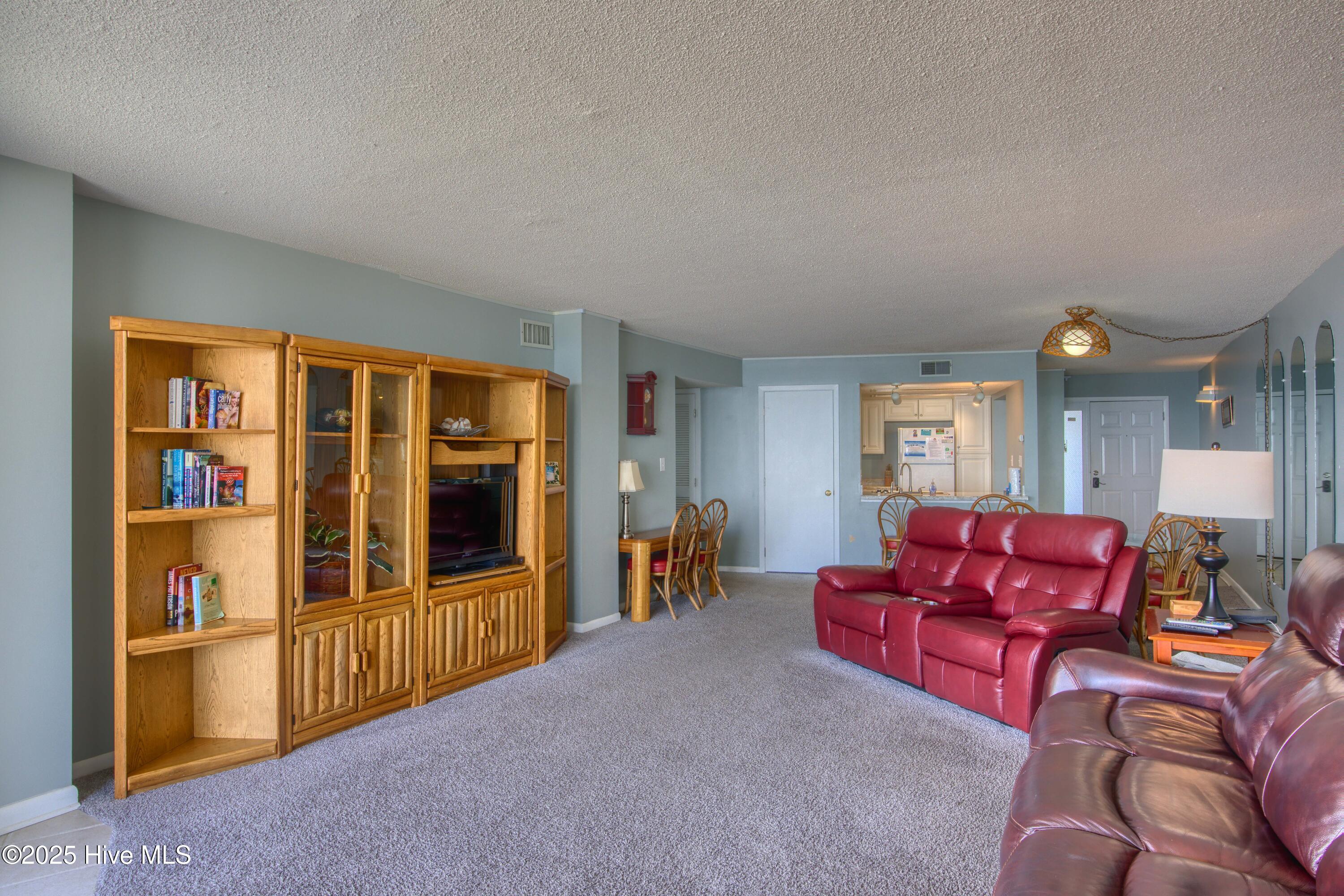 2000 New River Inlet Road, Unit 1207 North Topsail Beach, NC 28460 - Photo 22 of 30 1207 St. Regis - Living room and Bedroom