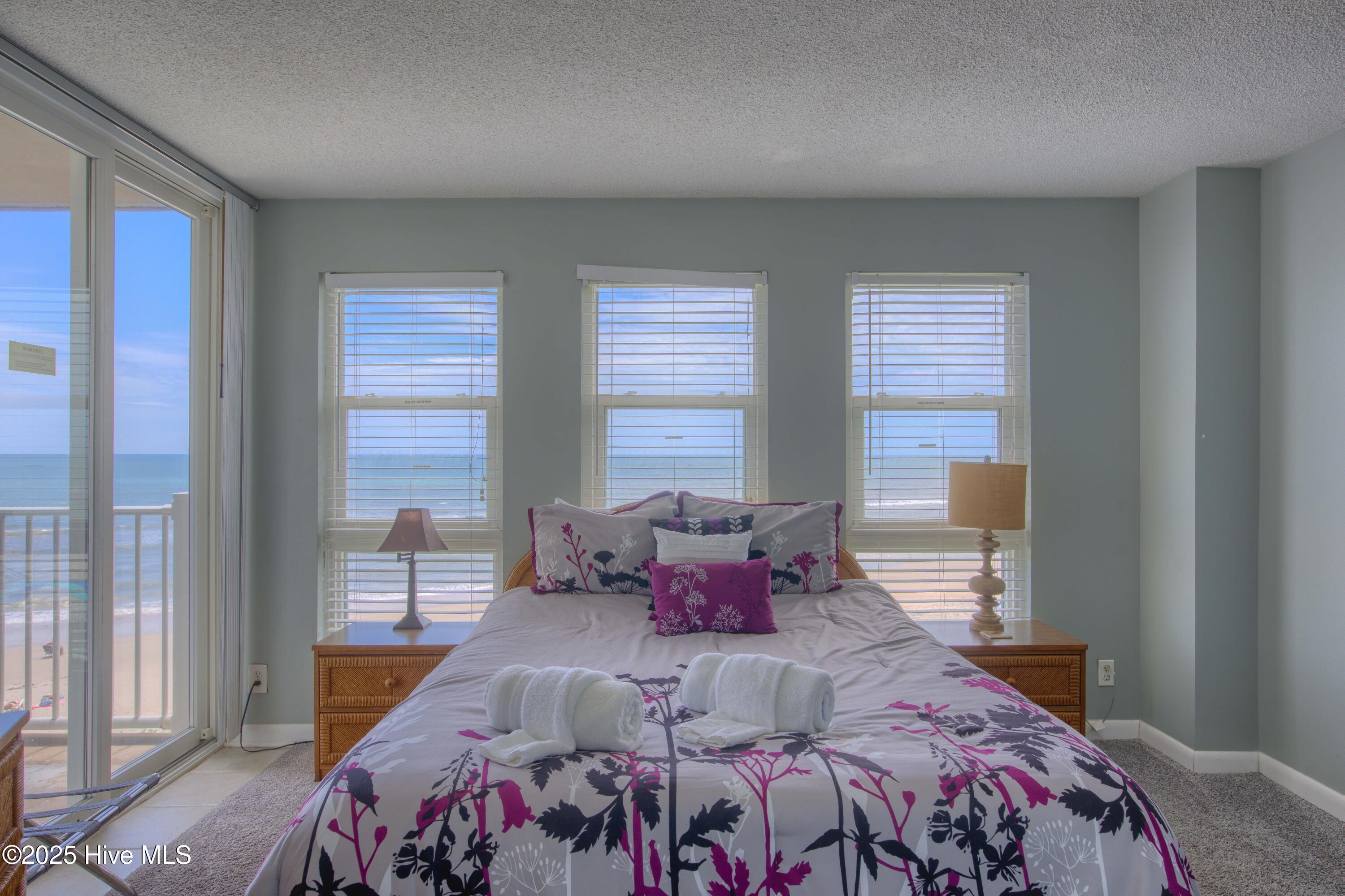 2000 New River Inlet Road, Unit 1207 North Topsail Beach, NC 28460 - Photo 8 of 30 1207 St. Regis - Living room and Bedroom