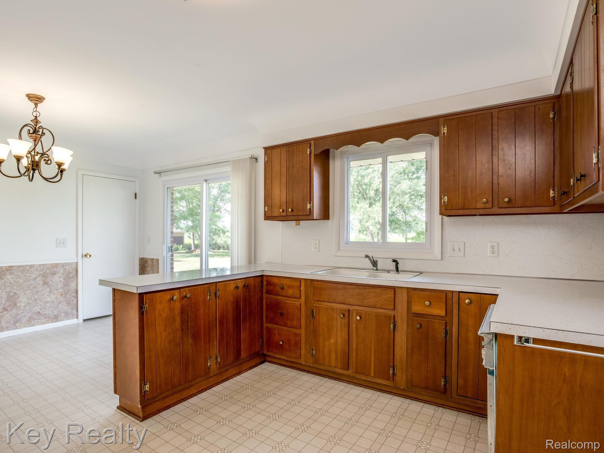 8040 Duffield Road Gaines, MI 48436 - Photo 9 of 25 Plenty of cabinet space!