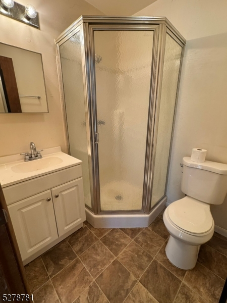 261 Old Chimney Ridge Road, Unit A Montague, NJ 07827 - Photo 12 of 43 a bathroom with a sink and a mirror