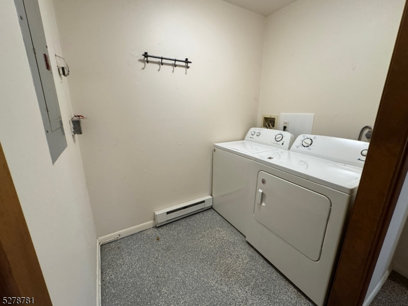 261 Old Chimney Ridge Road, Unit A Montague, NJ 07827 - Photo 15 of 43 a utility room with dryer and washer