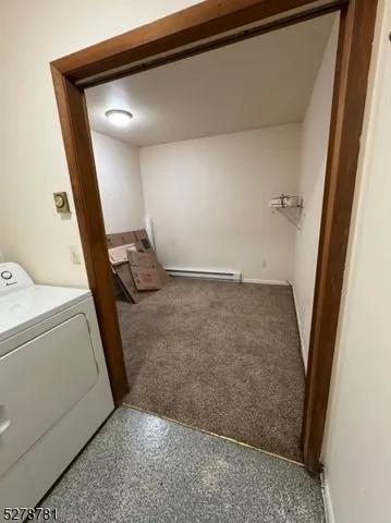 a view of balcony with wooden floor