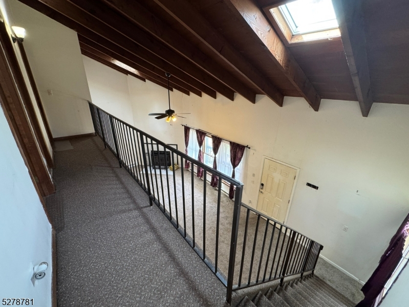261 Old Chimney Ridge Road, Unit A Montague, NJ 07827 - Photo 18 of 43 a view of staircase with railing and stairs