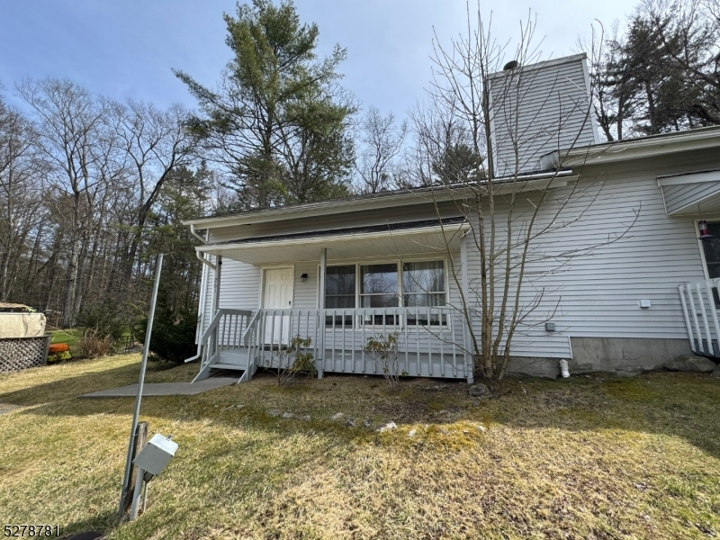 261 Old Chimney Ridge Road, Unit A Montague, NJ 07827 - Photo 28 of 43 a view of a house with a yard