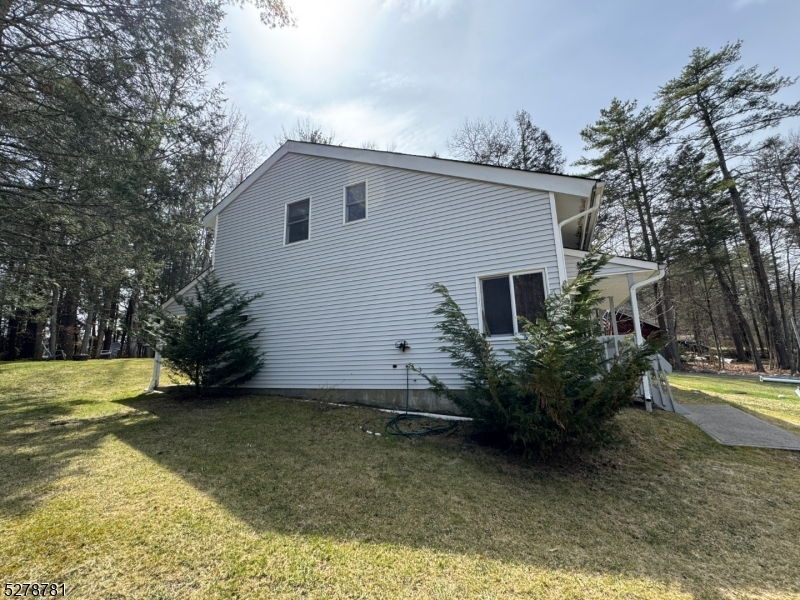 261 Old Chimney Ridge Road, Unit A Montague, NJ 07827 - Photo 33 of 43 a view of a house with backyard and garden