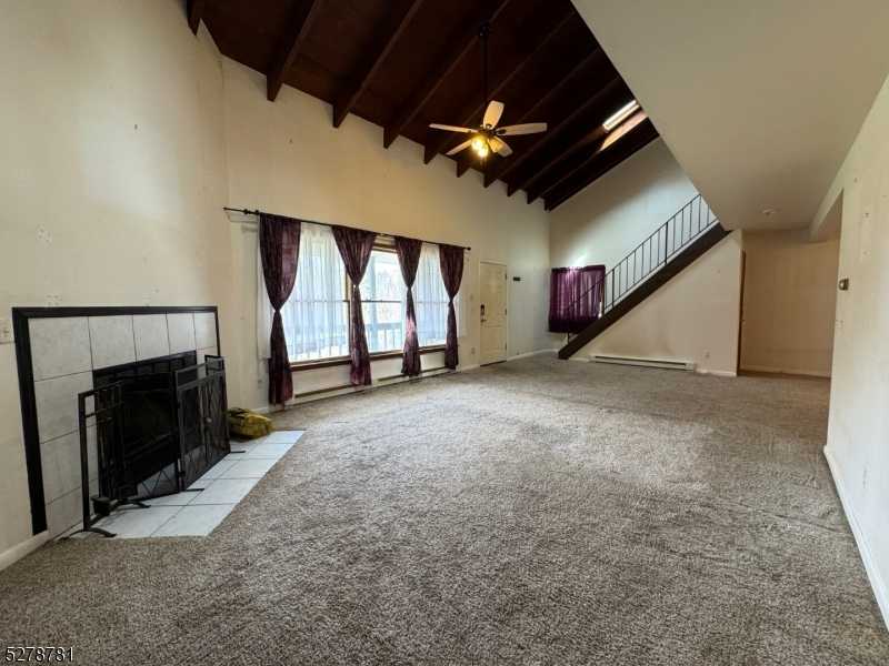 261 Old Chimney Ridge Road, Unit A Montague, NJ 07827 - Photo 4 of 43 a view of empty room with fireplace