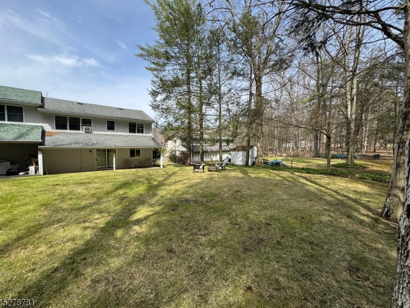 261 Old Chimney Ridge Road, Unit A Montague, NJ 07827 - Photo 42 of 43 a view of a house with a yard