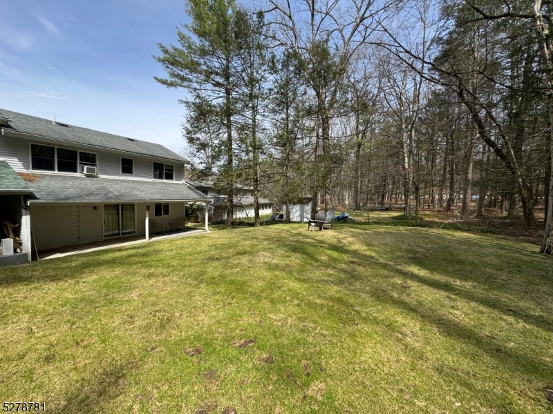 261 Old Chimney Ridge Road, Unit A Montague, NJ 07827 - Photo 43 of 43 a front view of house with yard and trees