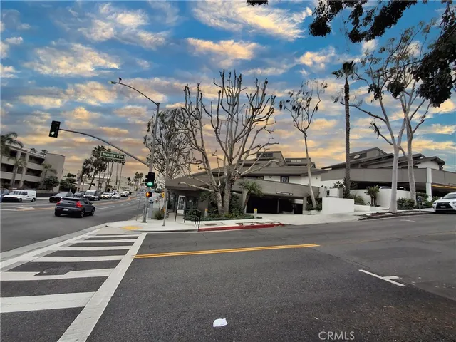 a view of a building with a street