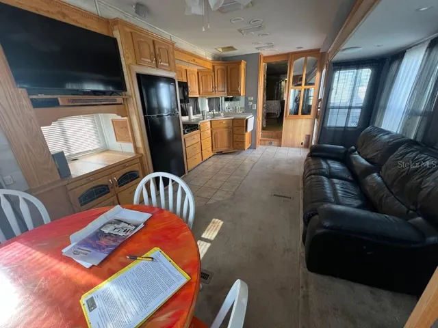 a spacious bathroom with a double vanity sink and a mirror