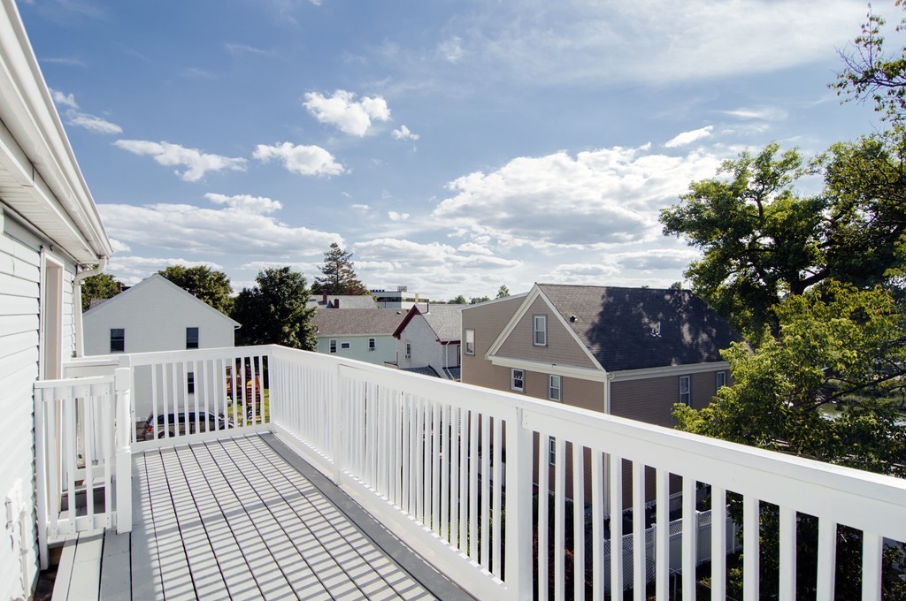 16 Port Norfolk Street, Unit 2 Boston, MA 02122 - Photo 12 of 13 a view of a houses with a balcony