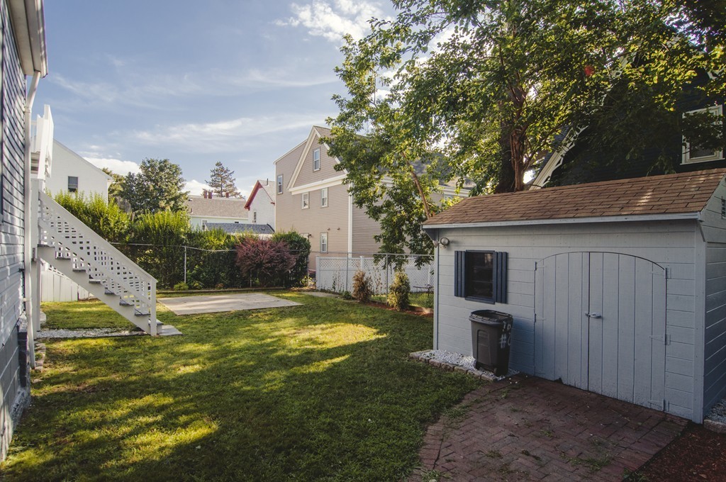 16 Port Norfolk Street, Unit 2 Boston, MA 02122 - Photo 13 of 13 a view of a backyard of the house