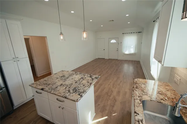 a view of kitchen and utility room