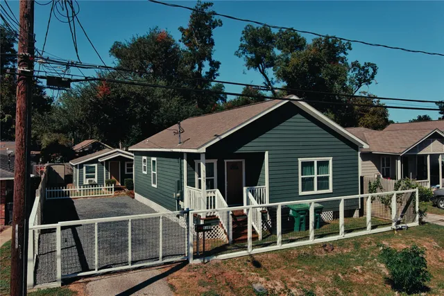 a front view of a house with a porch