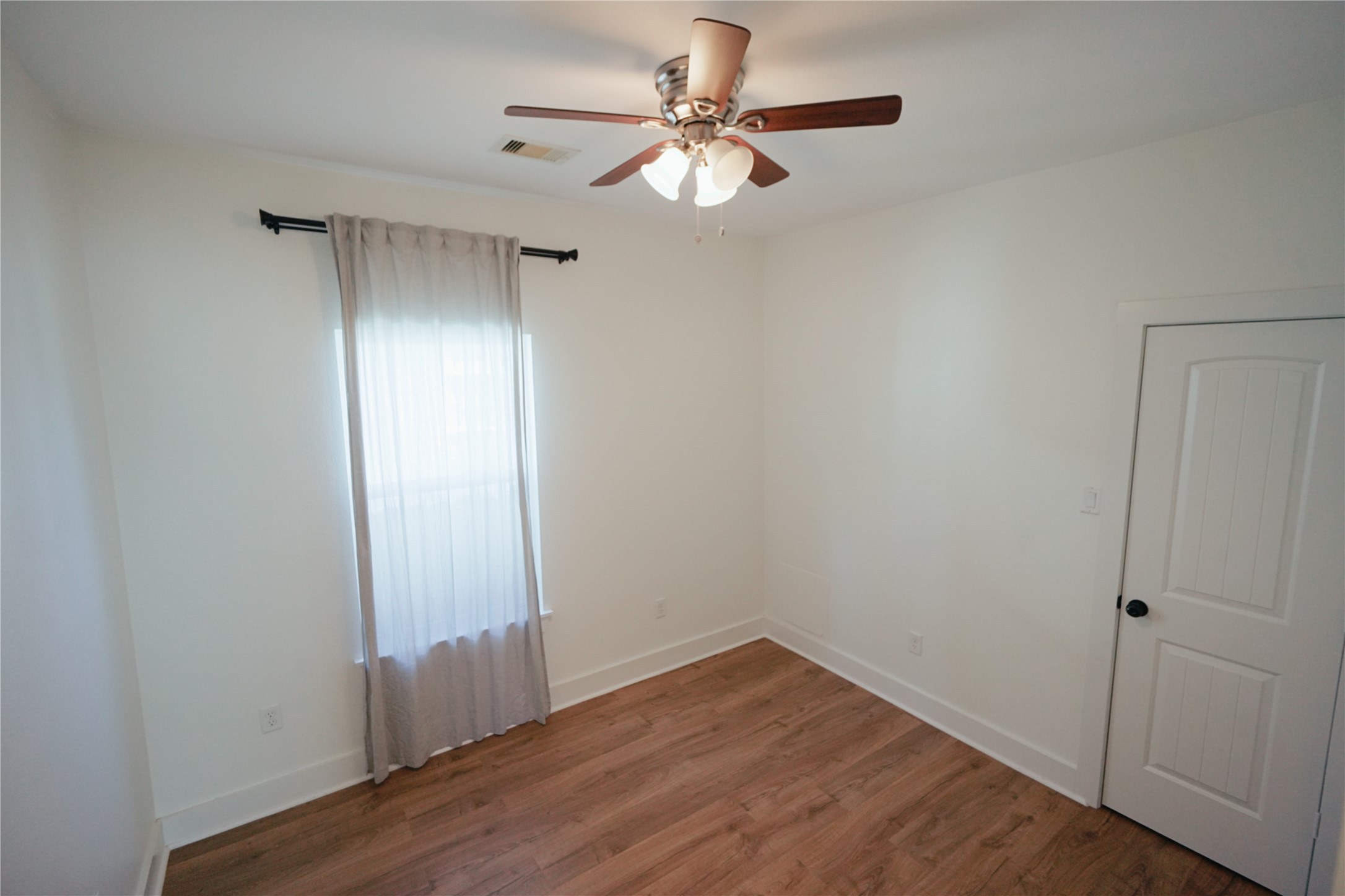 5105 Chapman Street Houston, TX 77009 - Photo 27 of 49 wooden floor in an empty room