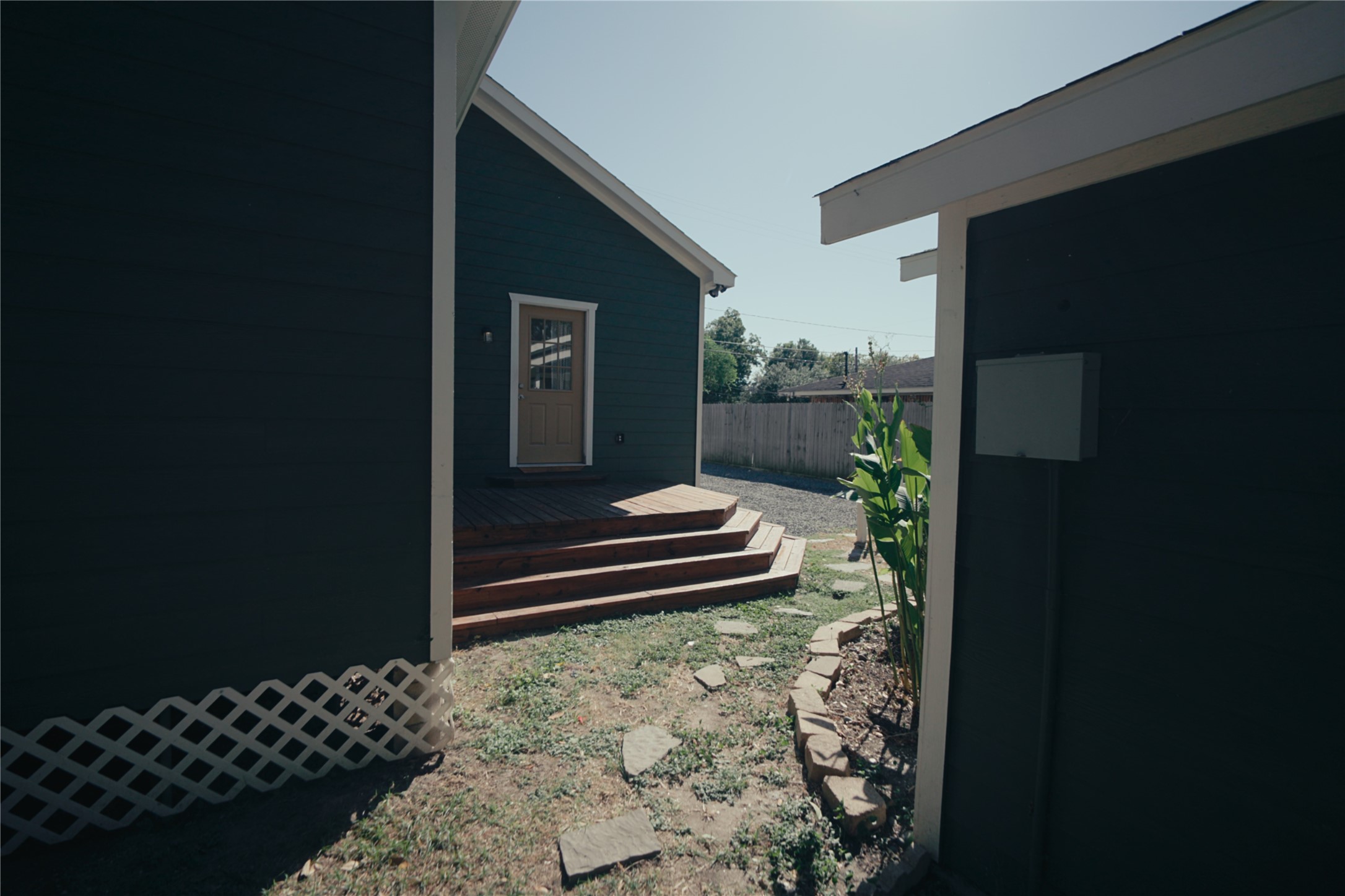 5105 Chapman Street Houston, TX 77009 - Photo 38 of 49 a wooden bench sitting in front of a door