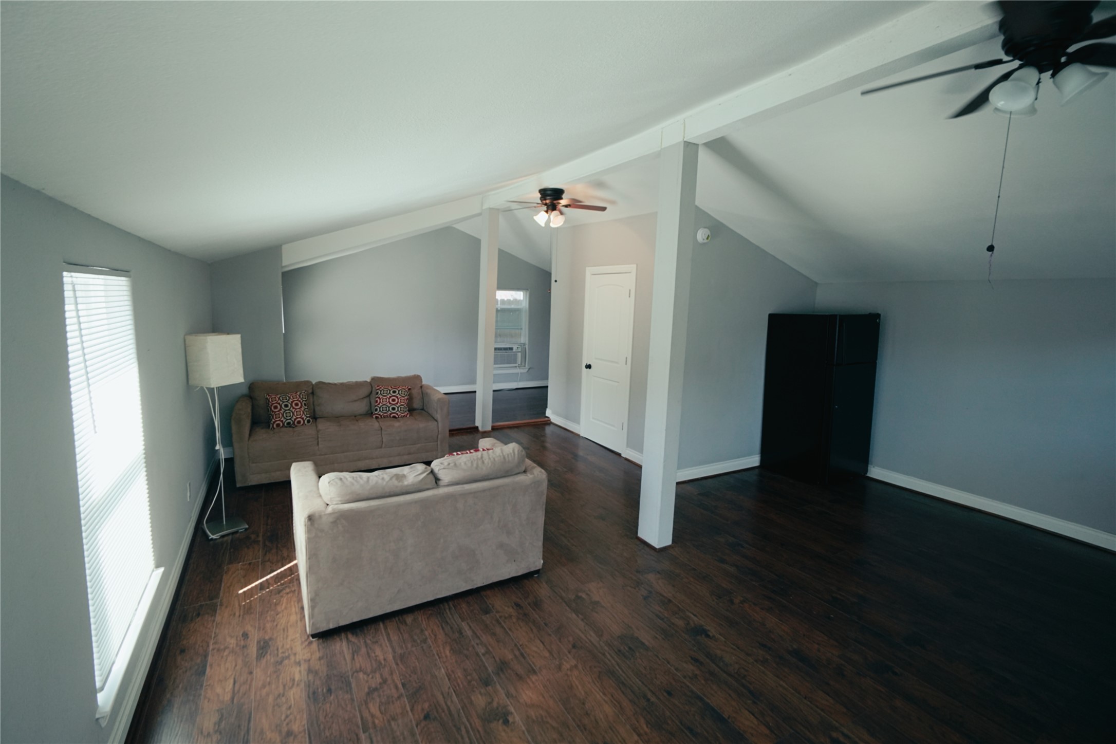 5105 Chapman Street Houston, TX 77009 - Photo 40 of 49 a living room with furniture and a wooden floor