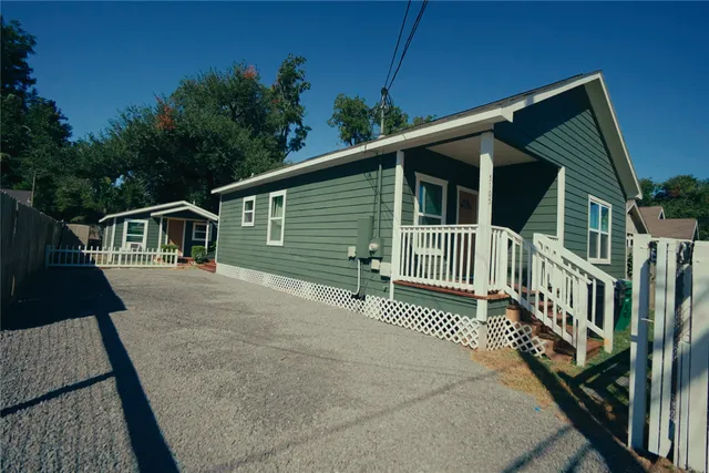 a house view with a garden space