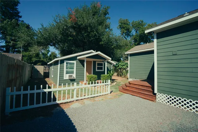 a view of a house with a deck