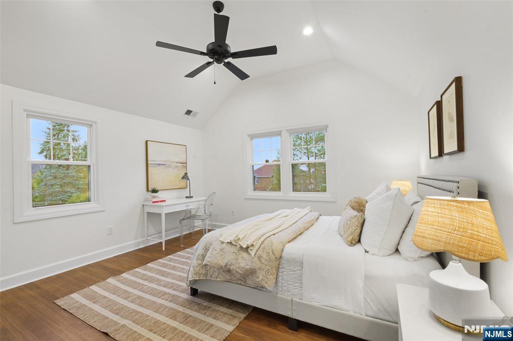 222 Ridge Road Rutherford, NJ 07070 - Photo 28 of 46 a bedroom with a bed and a window