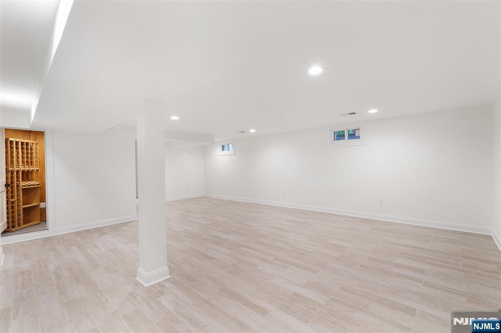 222 Ridge Road Rutherford, NJ 07070 - Photo 30 of 46 wooden floor in an empty room with a window