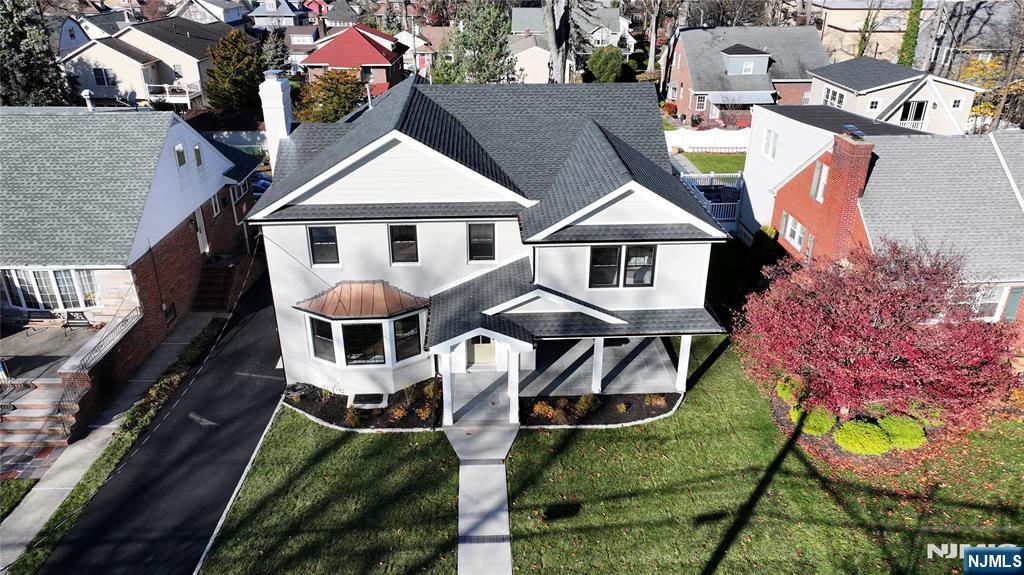 222 Ridge Road Rutherford, NJ 07070 - Photo 37 of 46 an aerial view of a house with garden space and street view