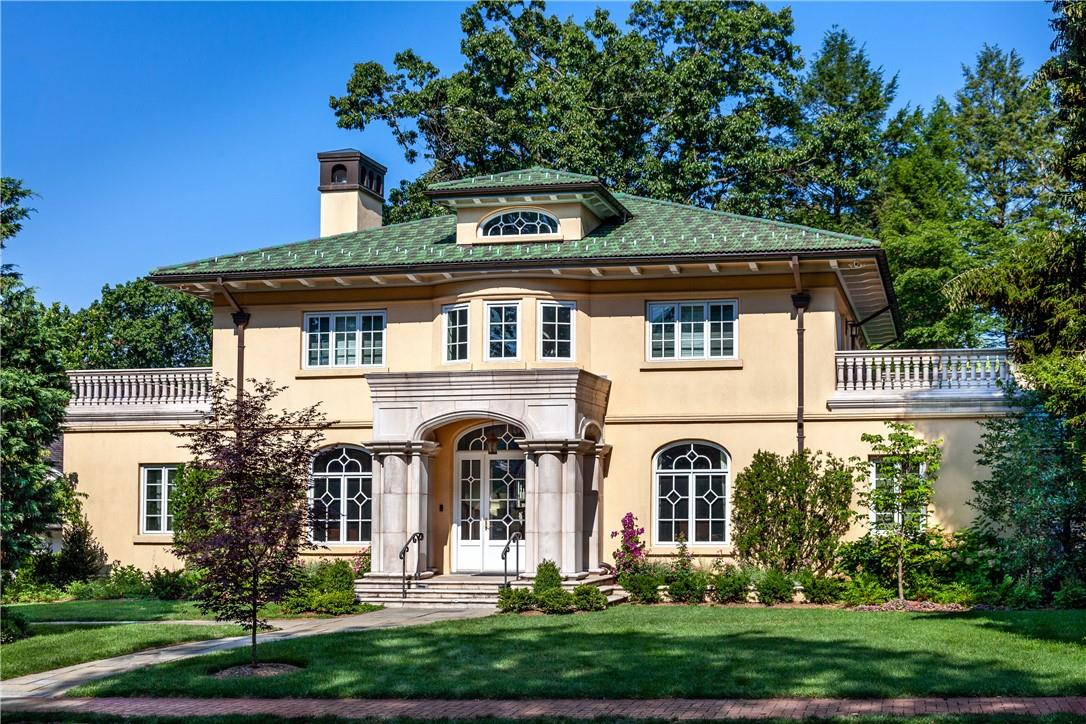 18 Ridge Road Bronxville, NY 10708 - Photo 1 of 1 front view of a house with a yard