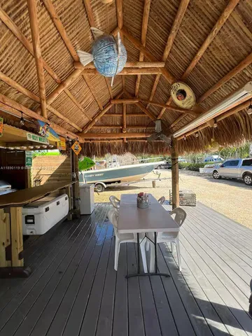 a view of dinning table and chairs in the room