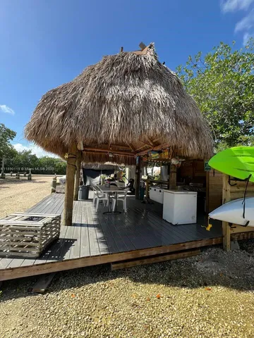 a kitchen with a sink appliances and cabinets