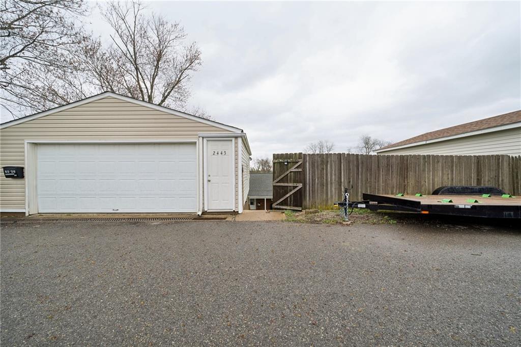2443 Brodhead Road Aliquippa, PA 15001 - Photo 25 of 32 Oversized 2-car garage has updates & allows for 2 vehichles. Currently houses a truck and SUV - lots of space!