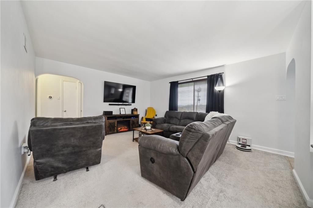 2443 Brodhead Road Aliquippa, PA 15001 - Photo 6 of 32 Time to get cozy! Freshly painted and new flooring.