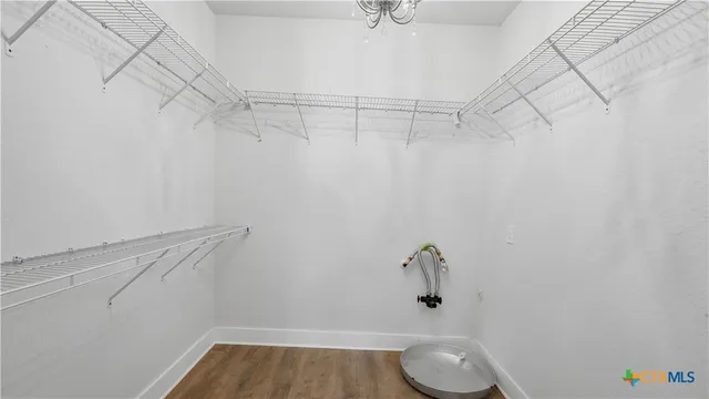 a bathroom with a shower and toilet