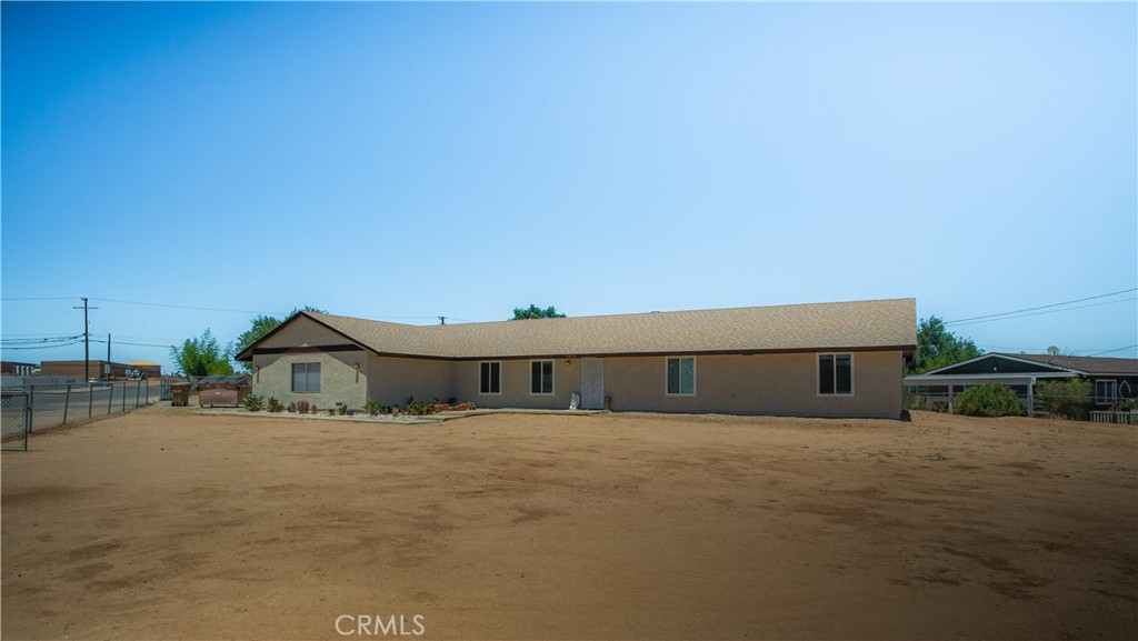 9450 Mango Avenue Hesperia, CA 92345 - Photo 1 of 1 a view of house with a outdoor space