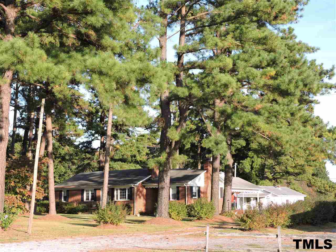 910 Antioch Church Road Timberlake, NC 27583 - Photo 14 of 22 a front view of a house with a yard