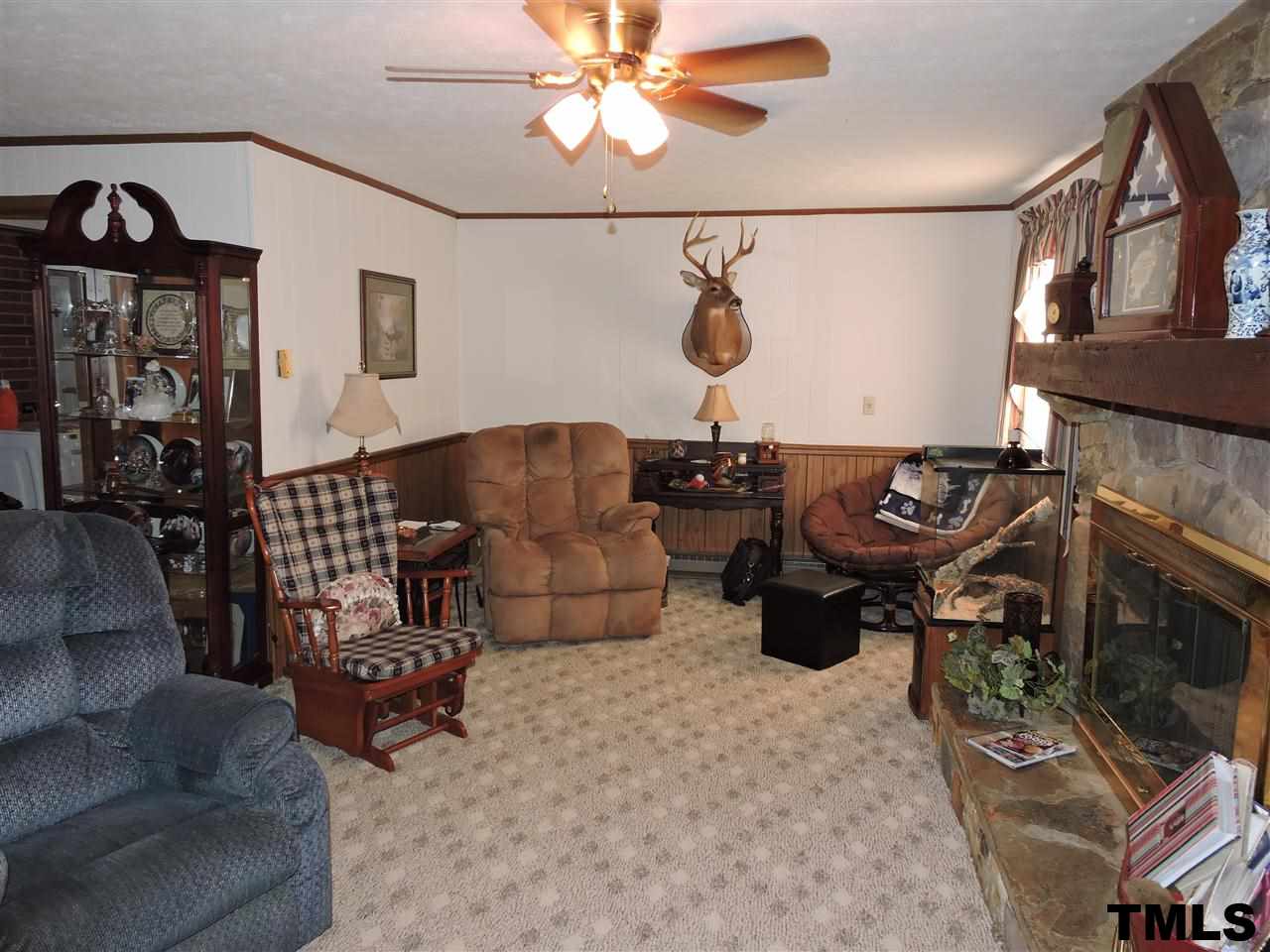 910 Antioch Church Road Timberlake, NC 27583 - Photo 5 of 22 a living room with furniture