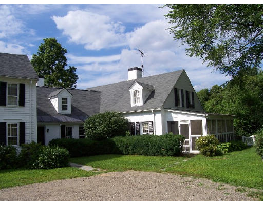 717 Main Street Boxford, MA 01921 - Photo 2 of 9 a front view of a house with garden