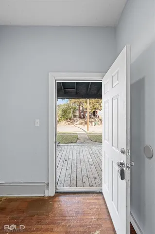 a view of a livingroom with wooden floor