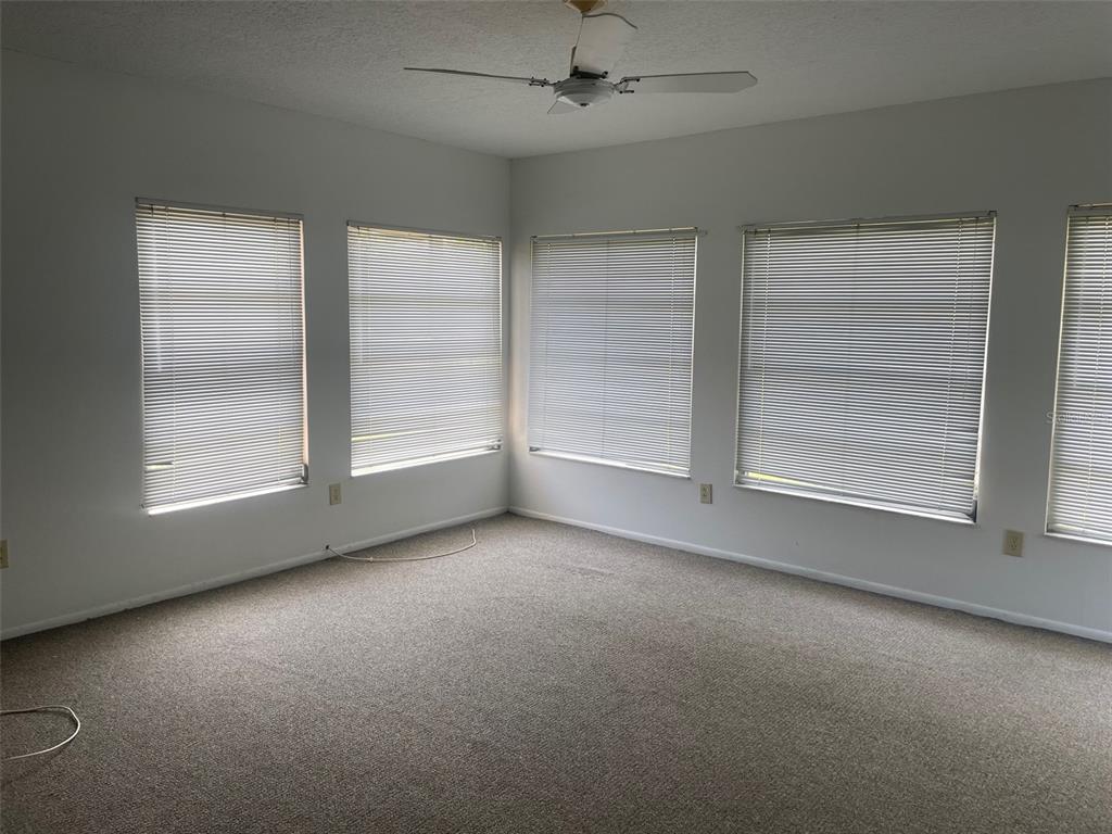 2019 High Ridge Drive Clearwater, FL 33763 - Photo 19 of 30 an empty room with a empty space and windows