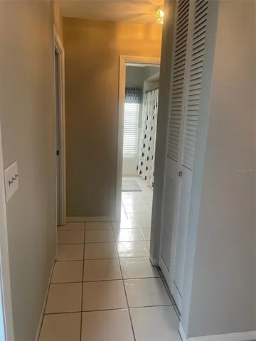 a bathroom with a vanity and a shower