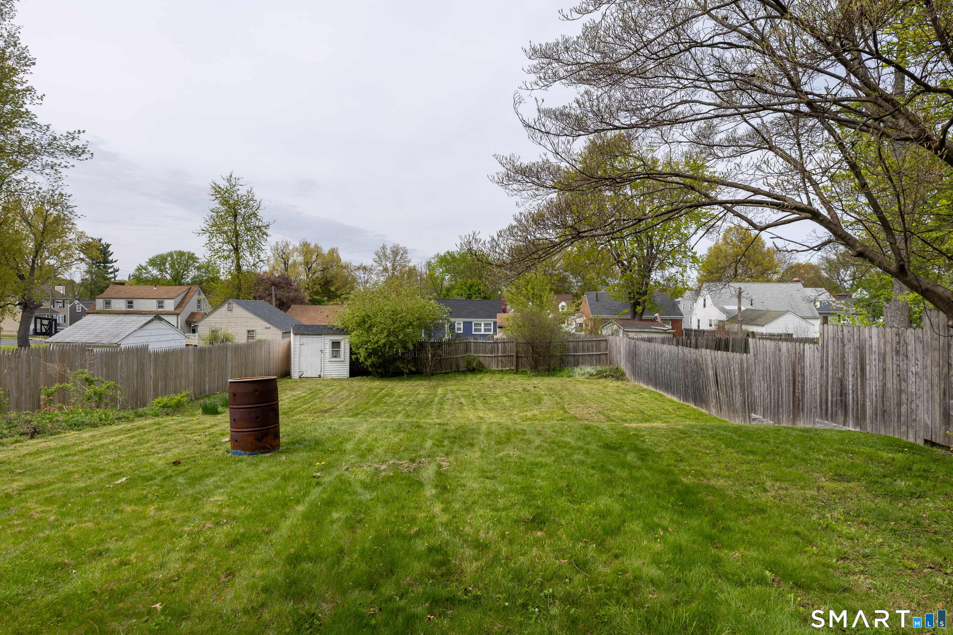 170 Amherst Street Hartford, CT 06106 - Photo 22 of 24 a backyard of a house with lots of green space