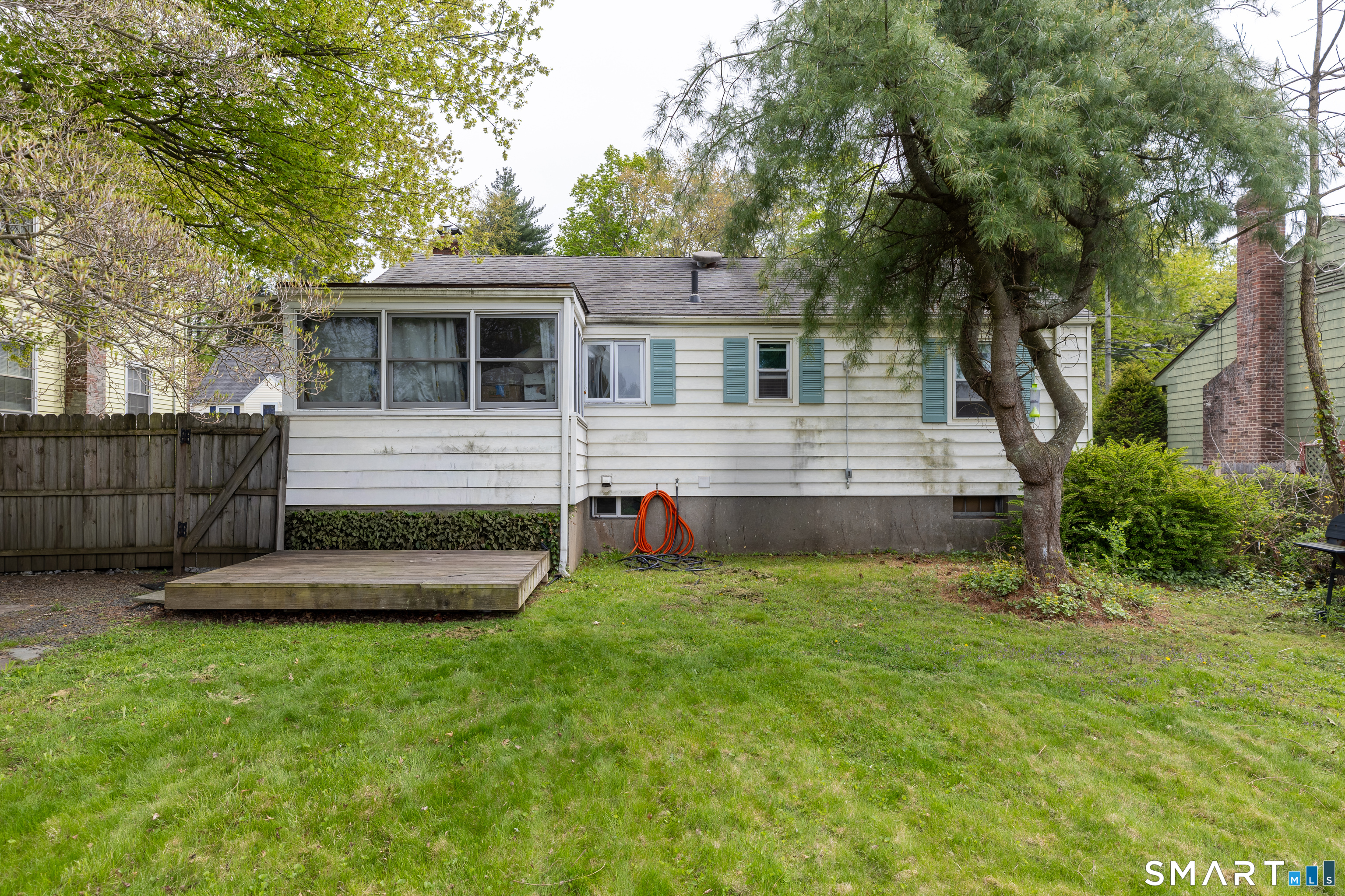 170 Amherst Street Hartford, CT 06106 - Photo 23 of 24 a view of a house with a backyard