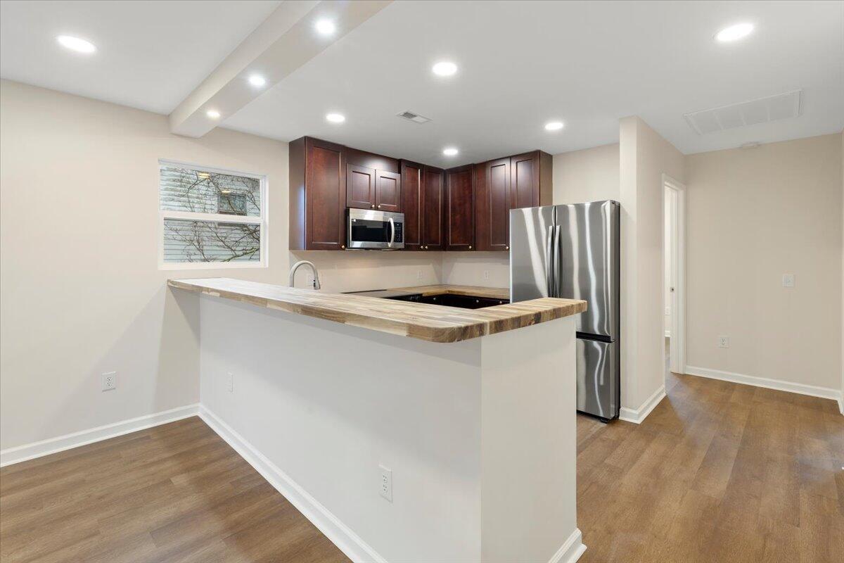 127 State Pulaski, VA 24301 - Photo 14 of 35 a view of kitchen with stainless steel appliances granite countertop refrigerator sink and cabinets