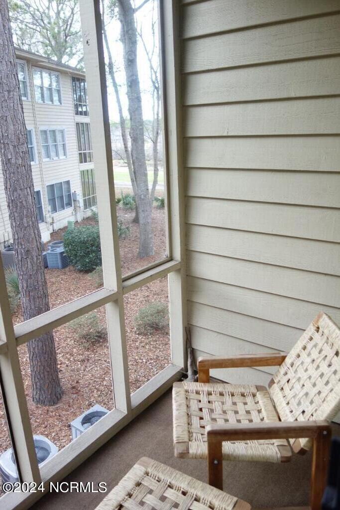 217 Clubhouse Road, Unit 3 Sunset Beach, NC 28468 - Photo 37 of 47 Screened Porch 2