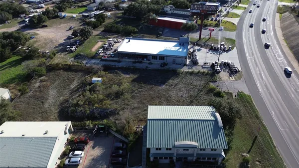 an aerial view of residential house with outdoor space