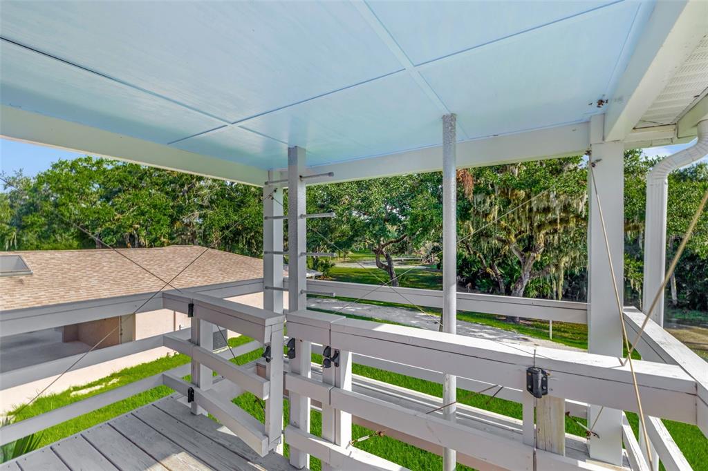 5793 Old Ranch Road Sarasota, FL 34241 - Photo 50 of 100 Fire Pole and Escape Ladder from the 2nd floor Balcony