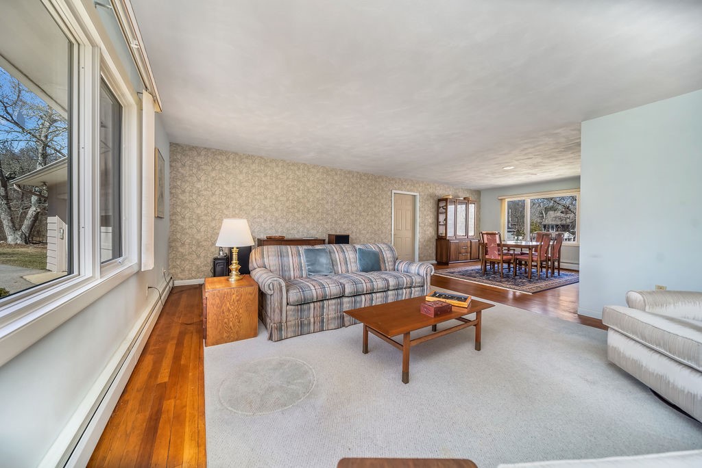 39 Brookside Drive Charlestown, RI 02813 - Photo 13 of 33 Very large living room with hardwoods