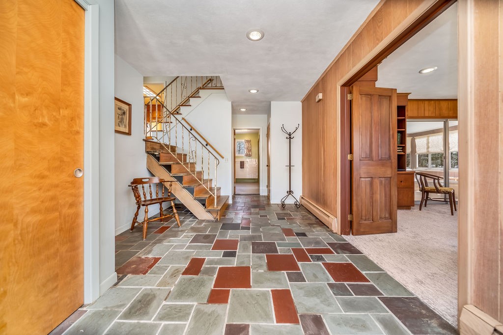 39 Brookside Drive Charlestown, RI 02813 - Photo 5 of 33 Very spacious foyer, family room to the left full bath near the stairs