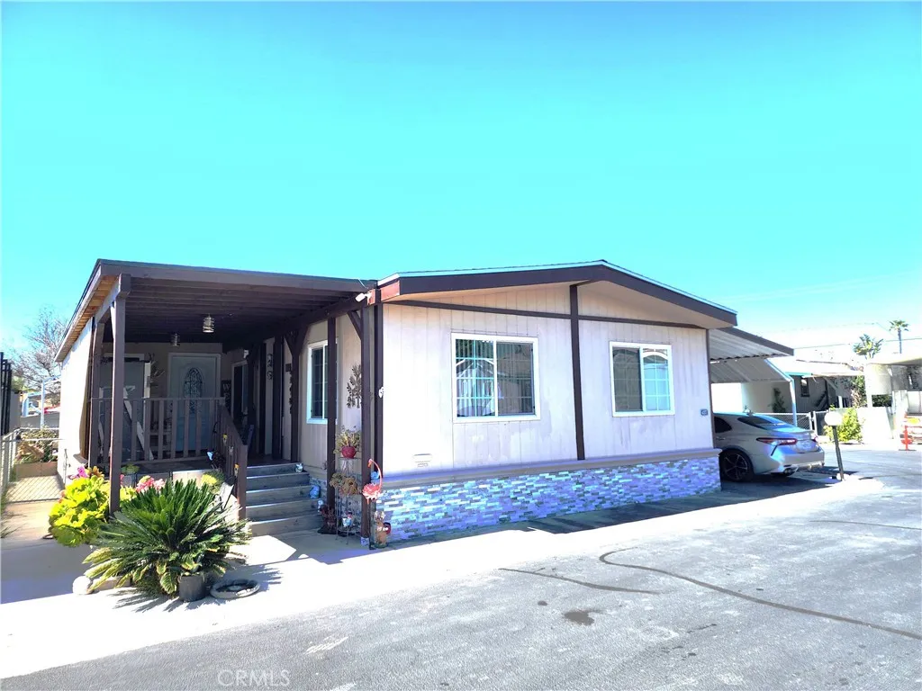 3825 Crestmore Road, Unit 437 Riverside, CA 92509 - Photo 1 of 1 a view of a house with patio