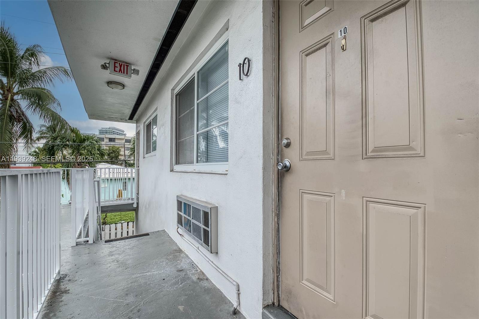 6921 Rue Vendome, Unit 10 Miami Beach, FL 33141 - Photo 12 of 27 a view of entryway with wooden floor